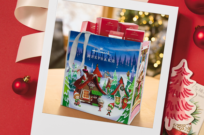 Polaroid with an image of a Keepsake tote bag filled with ornament boxes.